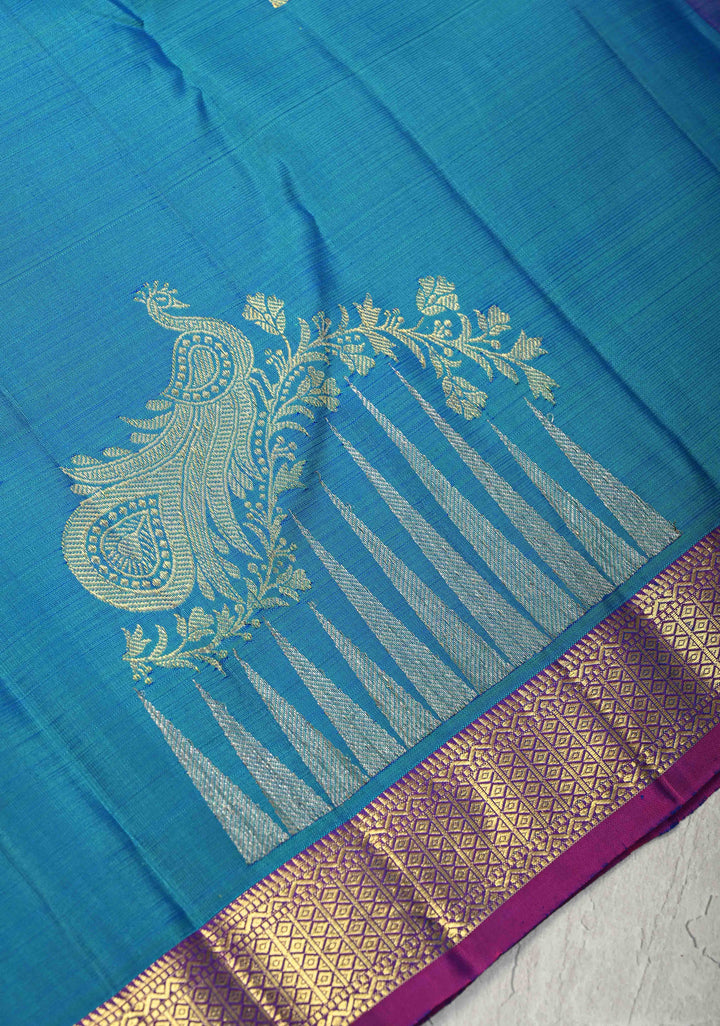 Blue and Green Dual tone Kanjivaram Pure Silk Saree with Zari butta and Peacock Floral Motif above Minimal zari Border  | SILK MARK CERTIFIED