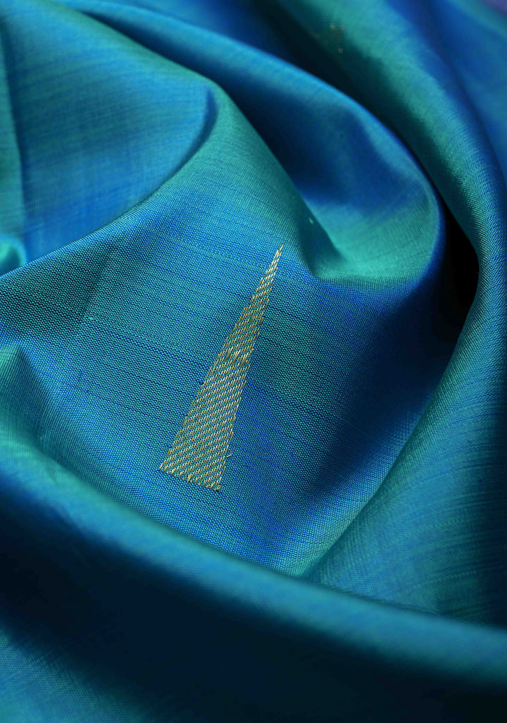 Blue and Green Dual tone Kanjivaram Pure Silk Saree with Zari butta and Peacock Floral Motif above Minimal zari Border  | SILK MARK CERTIFIED