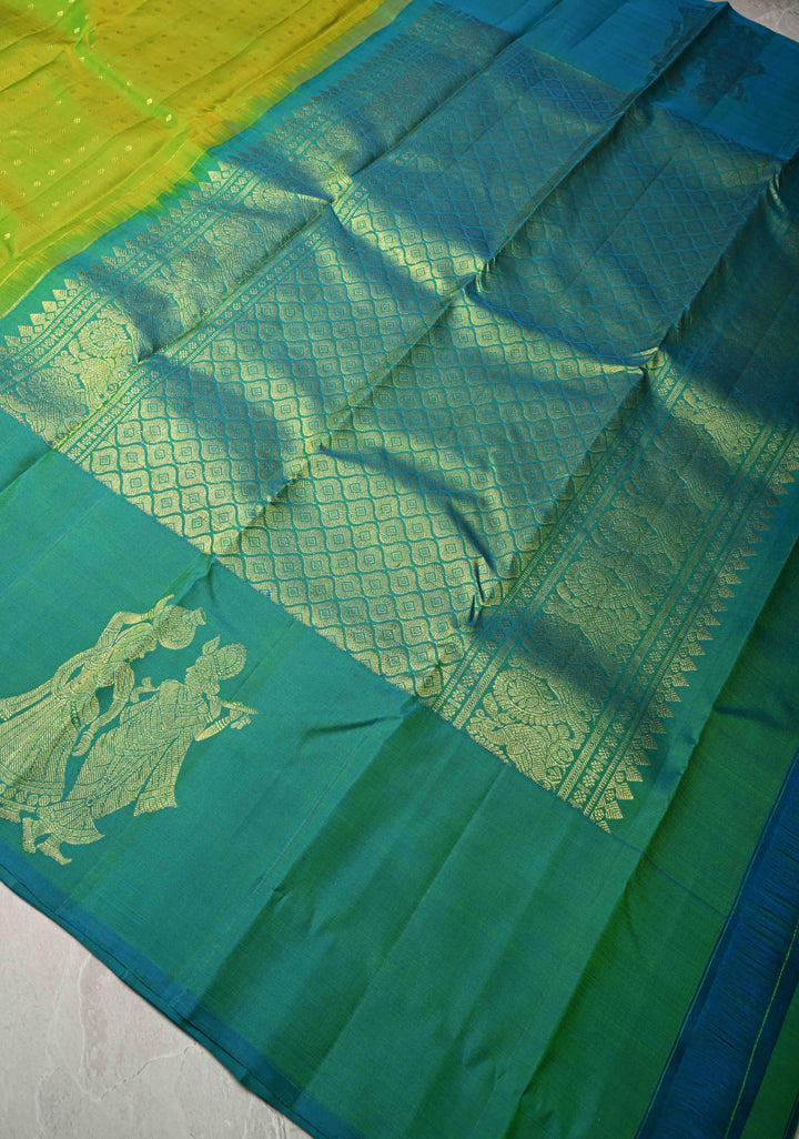 Chartreuse Kanjivaram Pure Silk Saree with zari Butti and Distinct Radha Krishna Motifs on Border | SILK MARK CERTIFIED