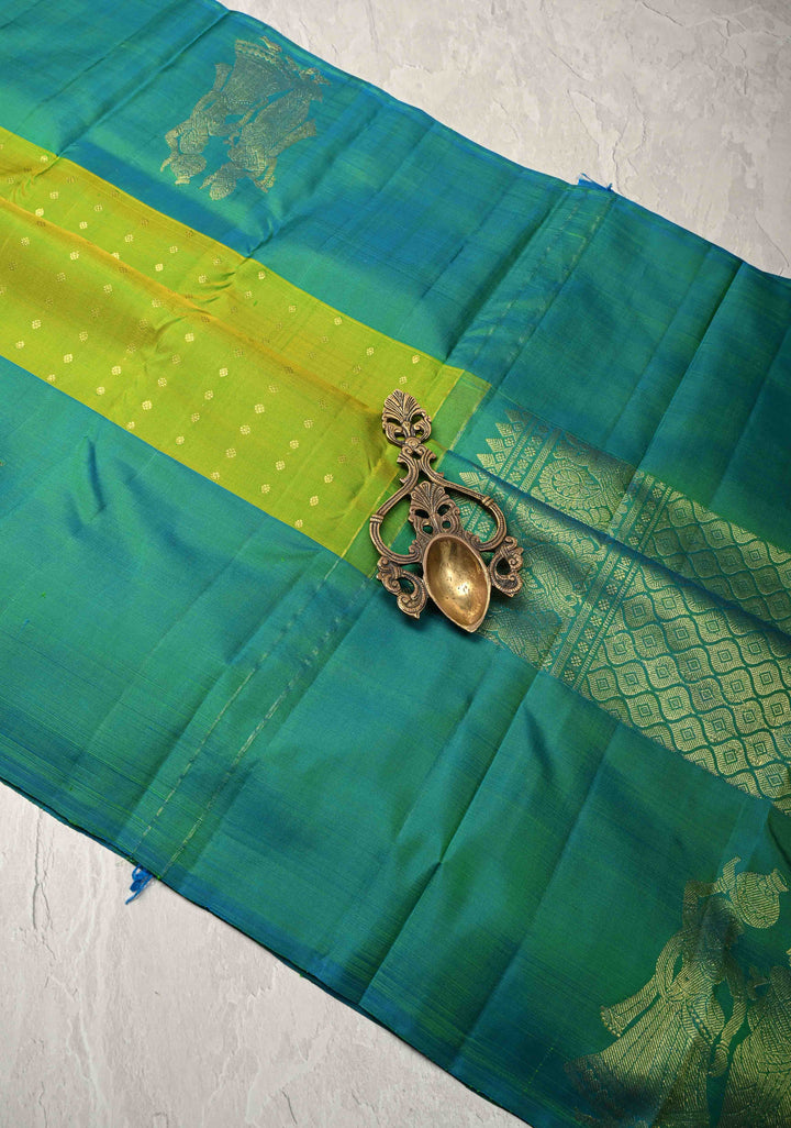 Chartreuse Kanjivaram Pure Silk Saree with zari Butti and Distinct Radha Krishna Motifs on Border | SILK MARK CERTIFIED