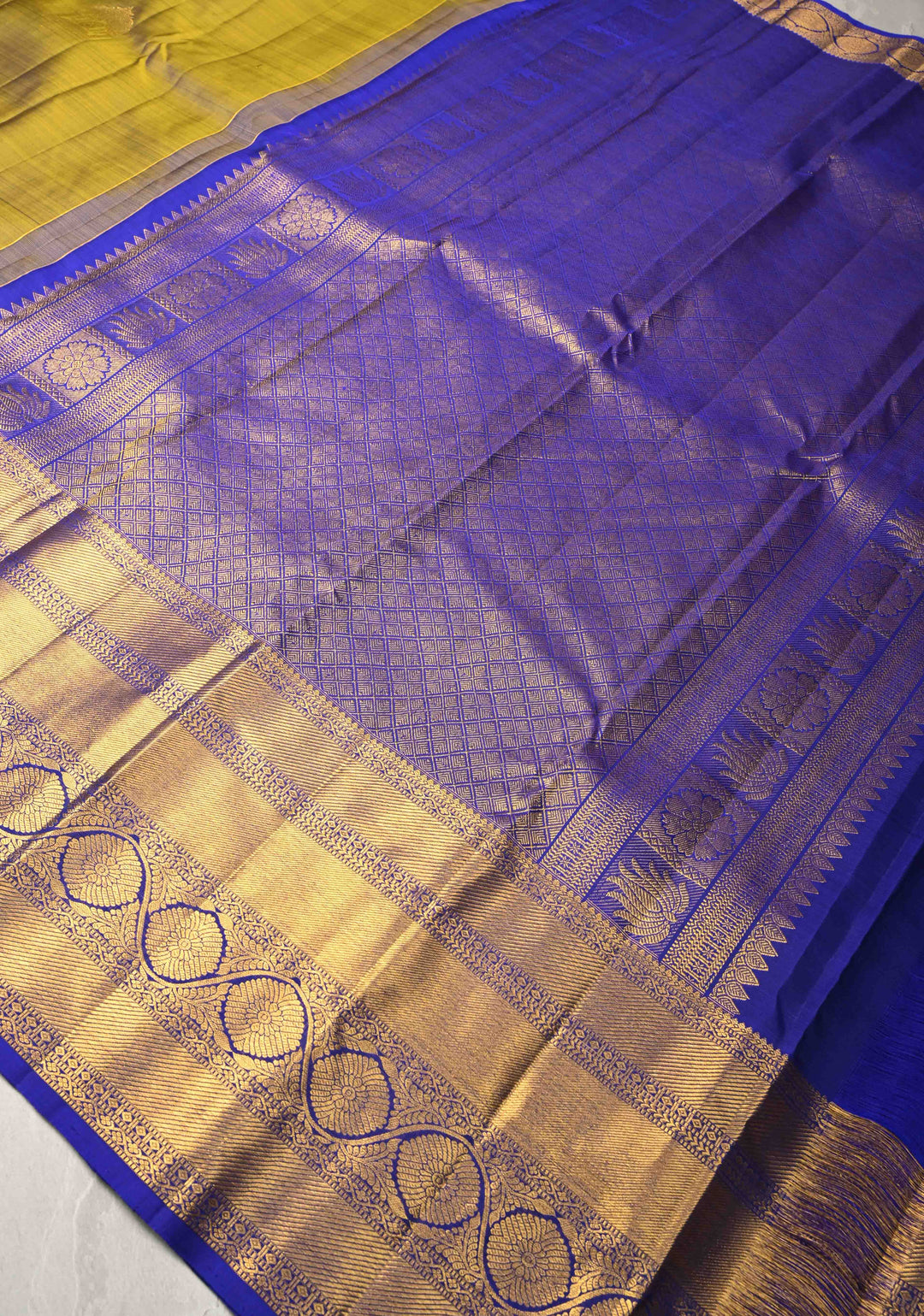 1 Gram Gold Zari Moss Green-Purple Dual tone Pure Kanjivaram Silk Saree with Arch Motifs and Wide Zari Border | SILK MARK CERTIFIED