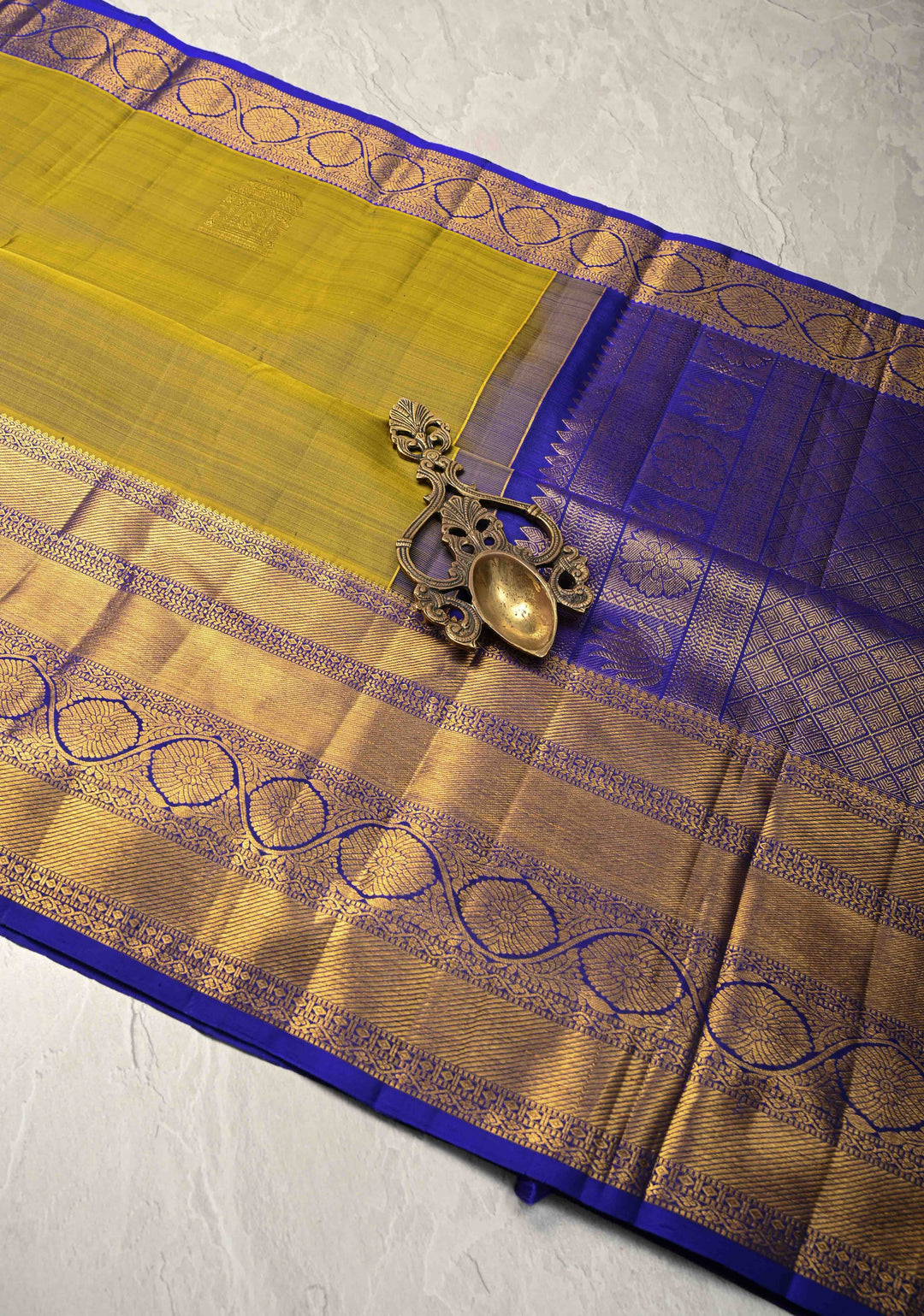 1 Gram Gold Zari Moss Green-Purple Dual tone Pure Kanjivaram Silk Saree with Arch Motifs and Wide Zari Border | SILK MARK CERTIFIED