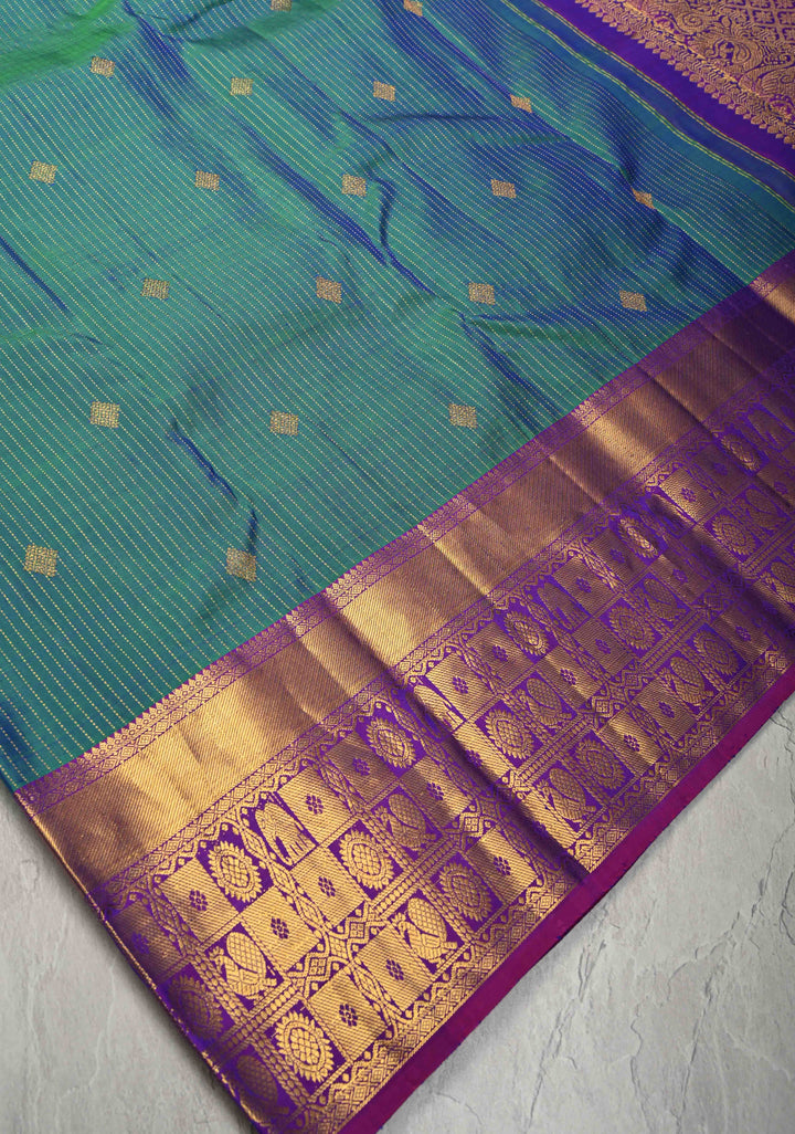 Peacock Blue Dual Tone Pure Kanjivaram Silk Saree with Vertical Stripes Zari Buttas and Contrast Zari Border | SILK MARK CERTIFIED
