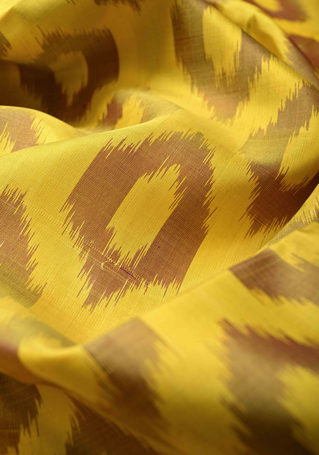 Yellow Fusion Ikkat Kanjivaram Soft Silk Saree with Geometric Barcode  and Tissue Border | SILK MARK CERTIFIED