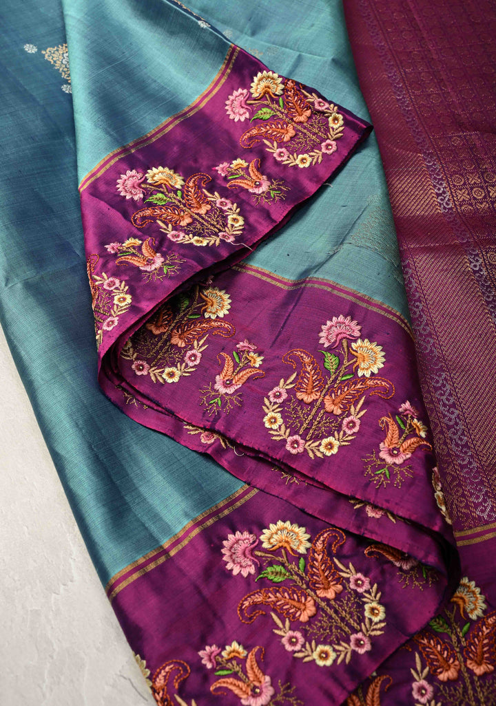 Dusty Blue Kanjivaram Soft Silk Saree with Zari Buttas and Machine Embroidery on Contrast Border | SILK MARK CERTIFIED