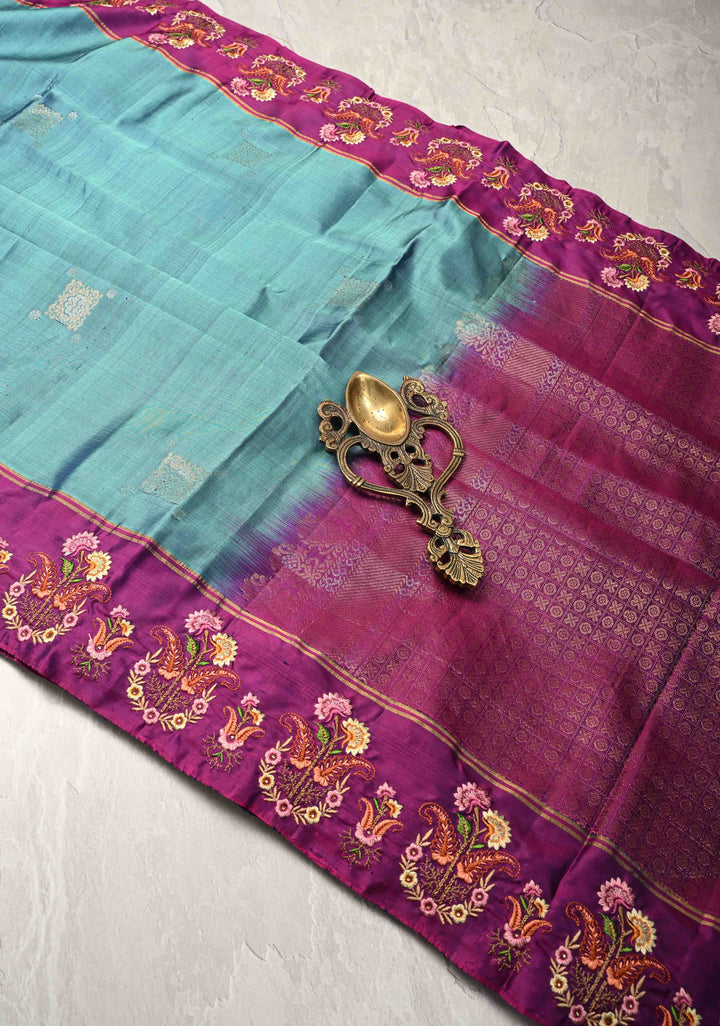 Dusty Blue Kanjivaram Soft Silk Saree with Zari Buttas and Machine Embroidery on Contrast Border | SILK MARK CERTIFIED