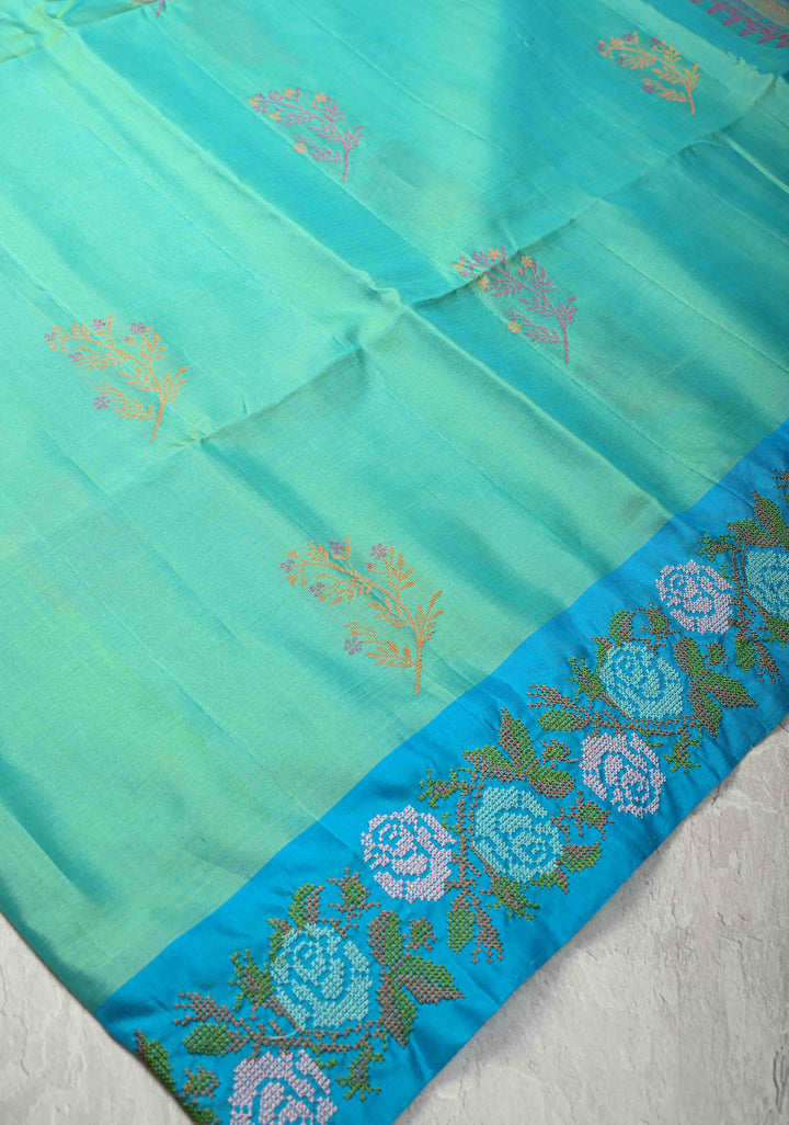 Sea Green Dual tone Kanjivaram Soft Silk Saree with Resham Weave Buttas and Cross Stitch Machine Embroidery Border | SILK MARK CERTIFIED