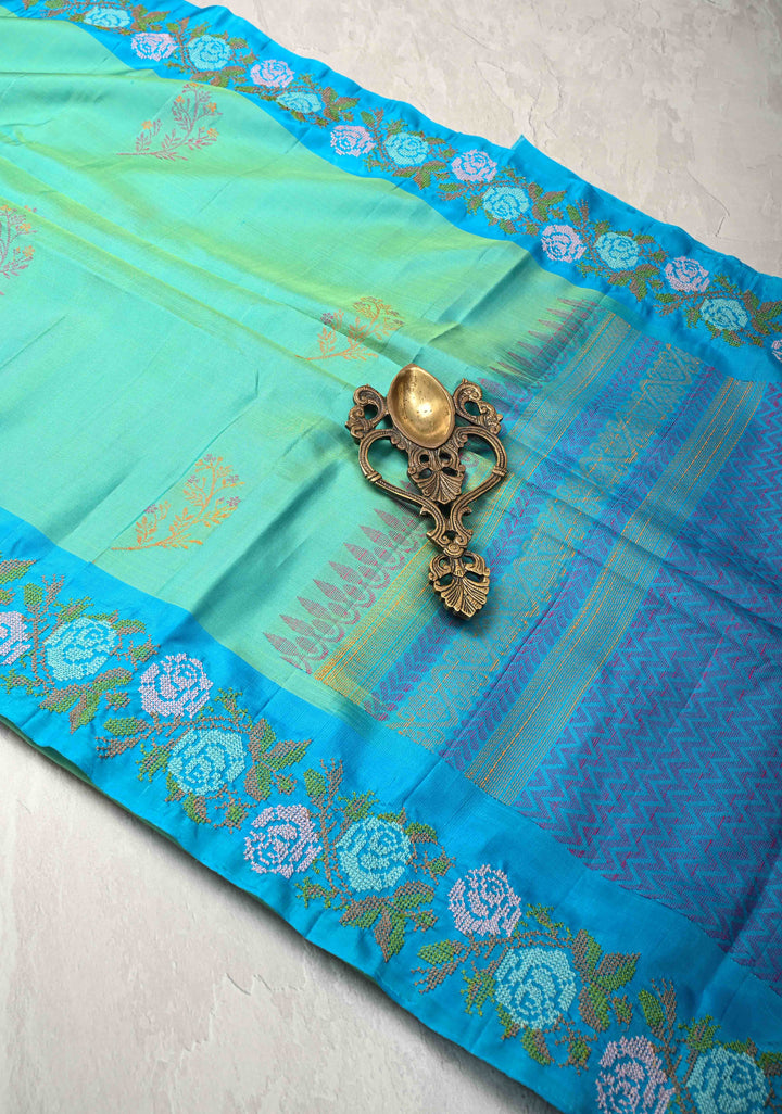 Sea Green Dual tone Kanjivaram Soft Silk Saree with Resham Weave Buttas and Cross Stitch Machine Embroidery Border | SILK MARK CERTIFIED