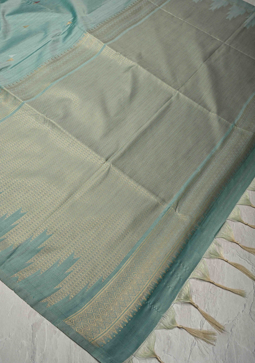 Sage Green Kanchi Semi Silk Saree with Meenakari  Buttas and Multicolor Temple Border