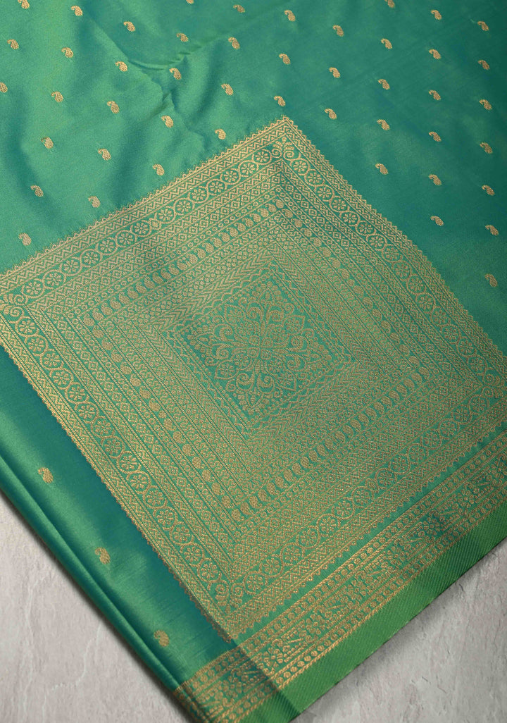 Dark Mint Green Dual tone Kanchi Semi Silk Saree with Paisley Zari Buttas and Geomatric Motifs on Border