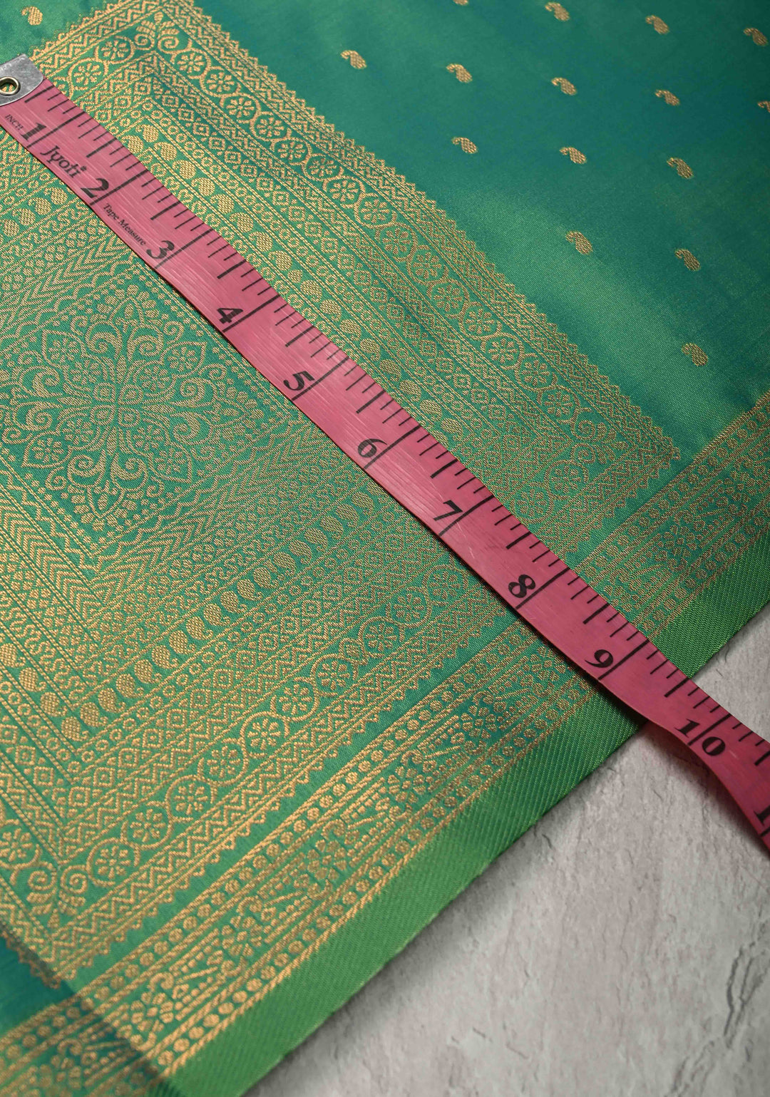 Dark Mint Green Dual tone Kanchi Semi Silk Saree with Paisley Zari Buttas and Geomatric Motifs on Border
