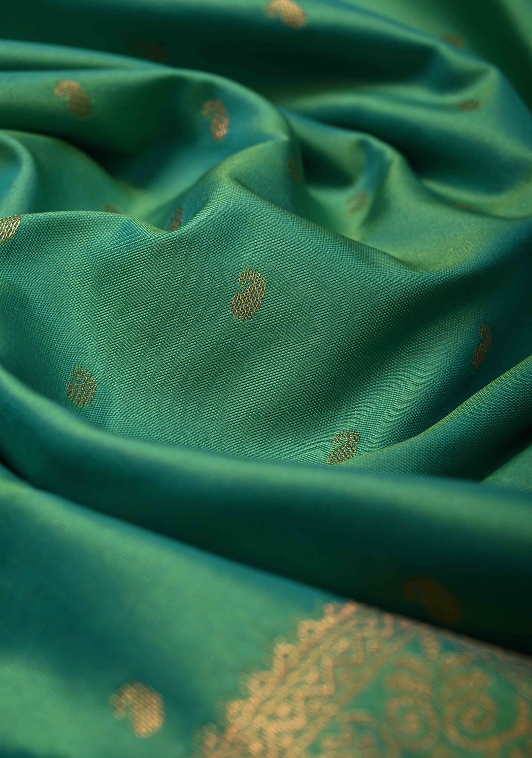 Dark Mint Green Dual tone Kanchi Semi Silk Saree with Paisley Zari Buttas and Geomatric Motifs on Border