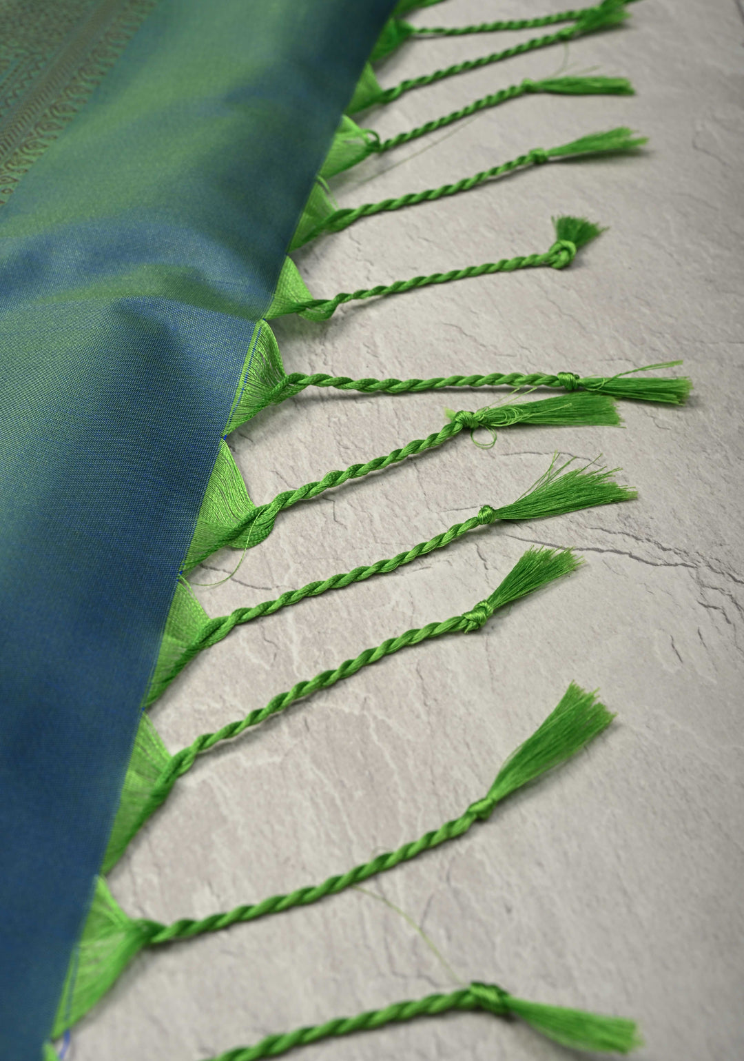 Green Dual tone Kanchi Semi Silk Saree with Paisley Zari Buttas and Geomatric Motifs on Border