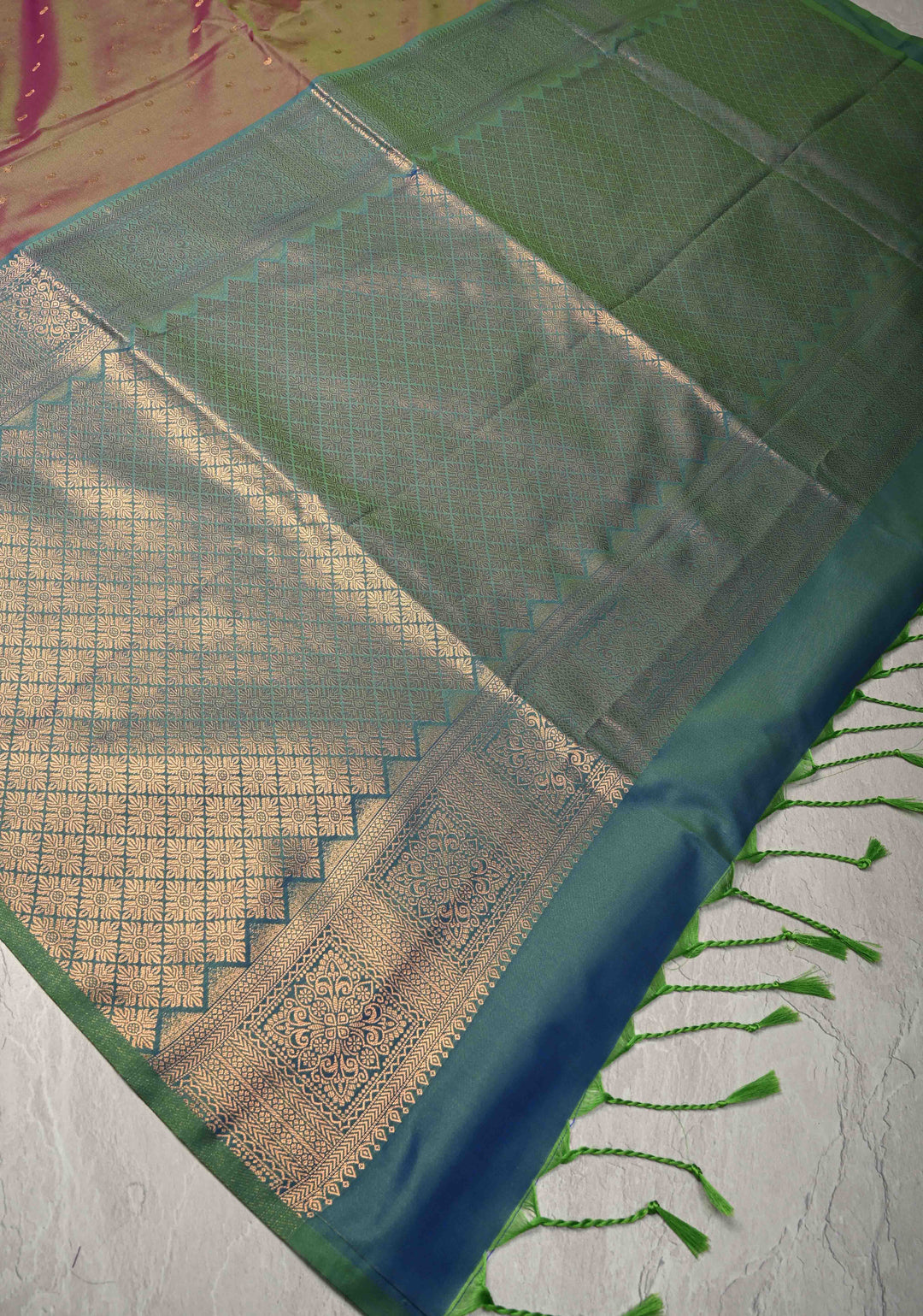Green Dual tone Kanchi Semi Silk Saree with Paisley Zari Buttas and Geomatric Motifs on Border