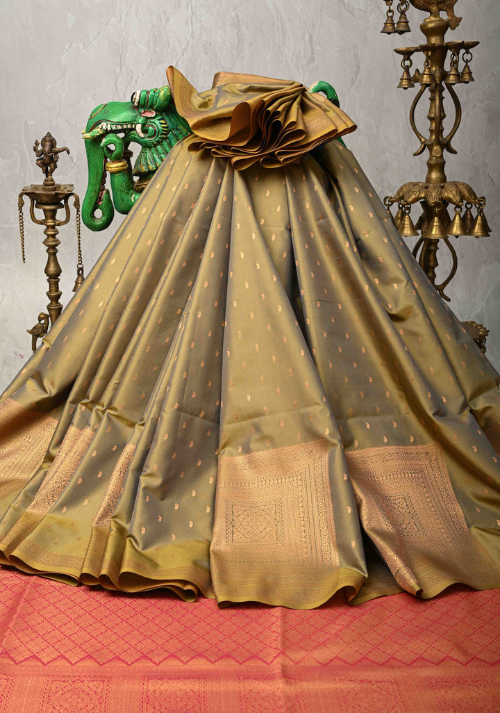Olive Yellow Kanchi Semi Silk Saree with Paisley Zari Buttas and Geomatric Motifs on Border