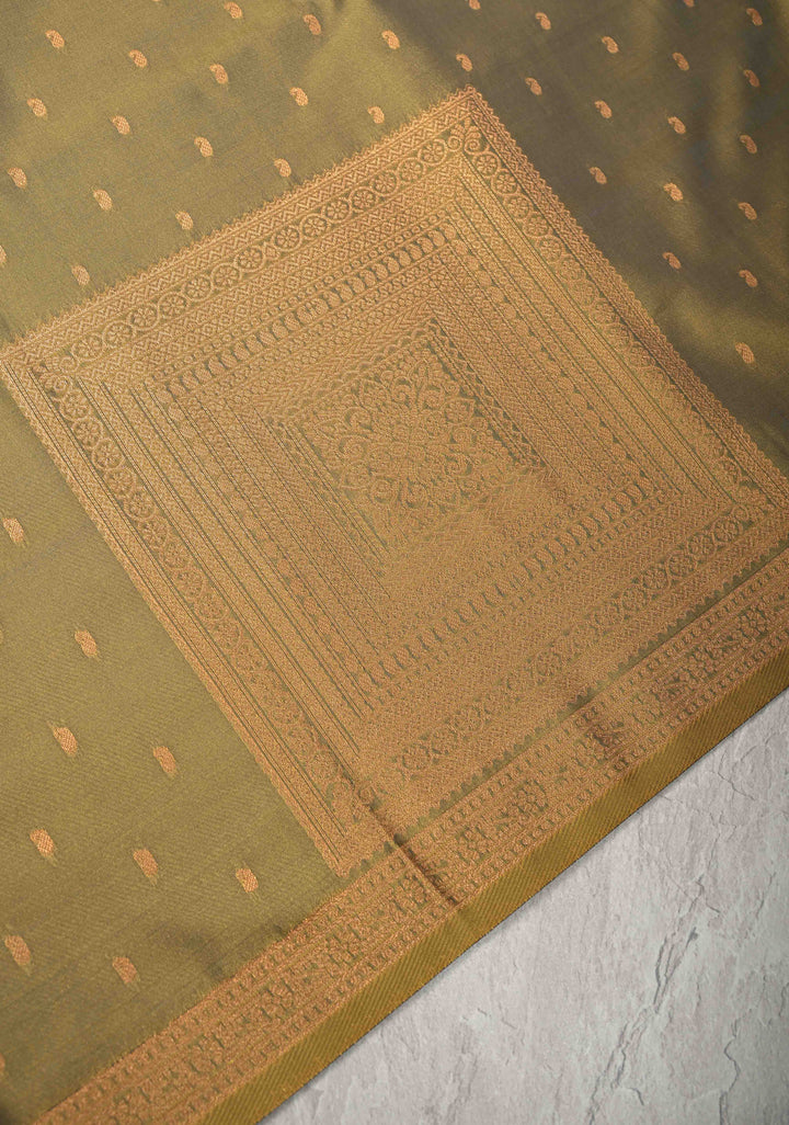 Olive Yellow Kanchi Semi Silk Saree with Paisley Zari Buttas and Geomatric Motifs on Border