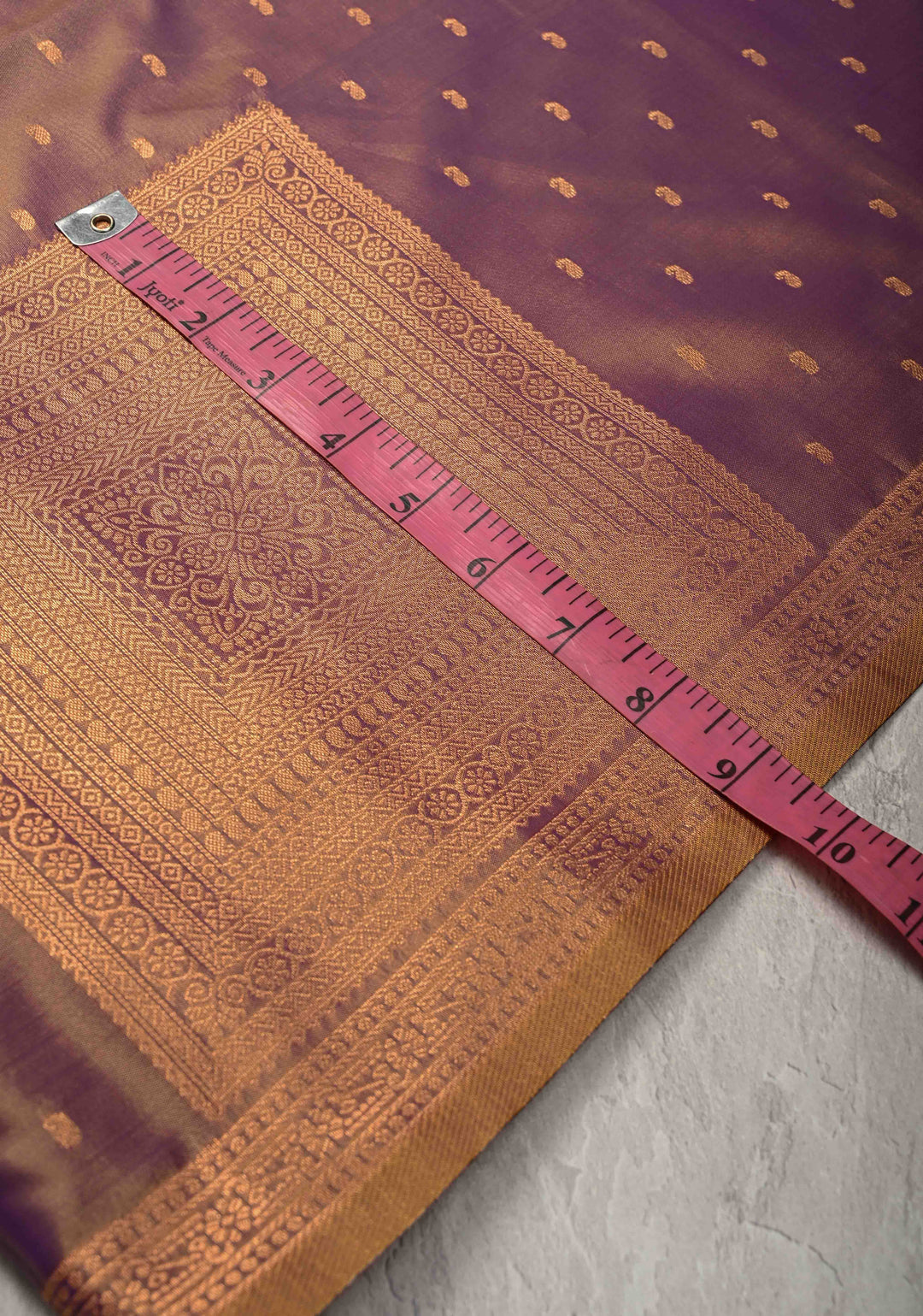 Plum Dual tone Kanchi Semi Silk Saree with Paisley Zari Buttas and Geomatric Motifs on Border