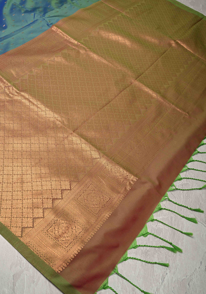 Peacock Blue Dual tone Kanchi Semi Silk Saree with Paisley Zari Buttas and Geomatric Motifs on Border