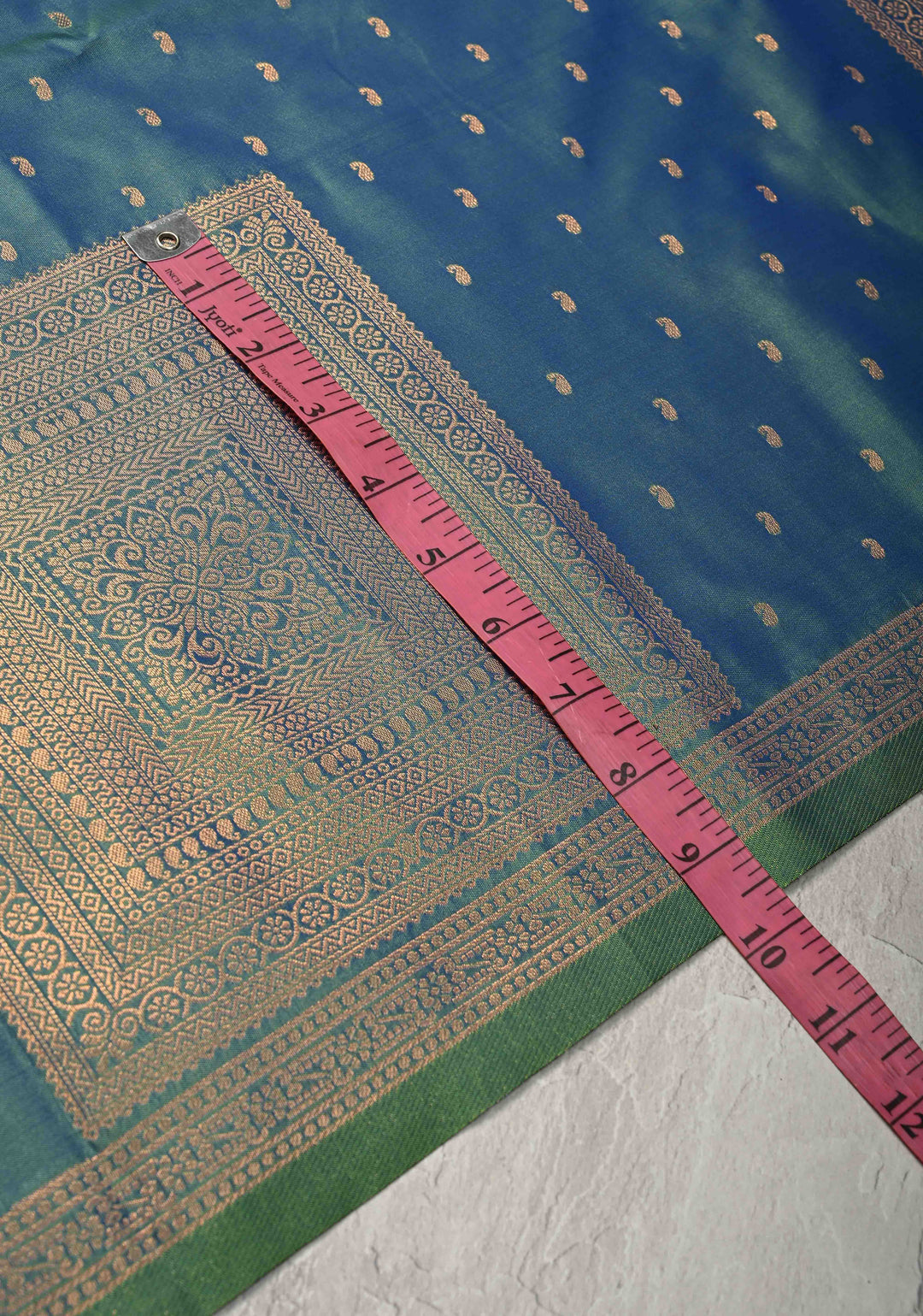 Peacock Blue Dual tone Kanchi Semi Silk Saree with Paisley Zari Buttas and Geomatric Motifs on Border