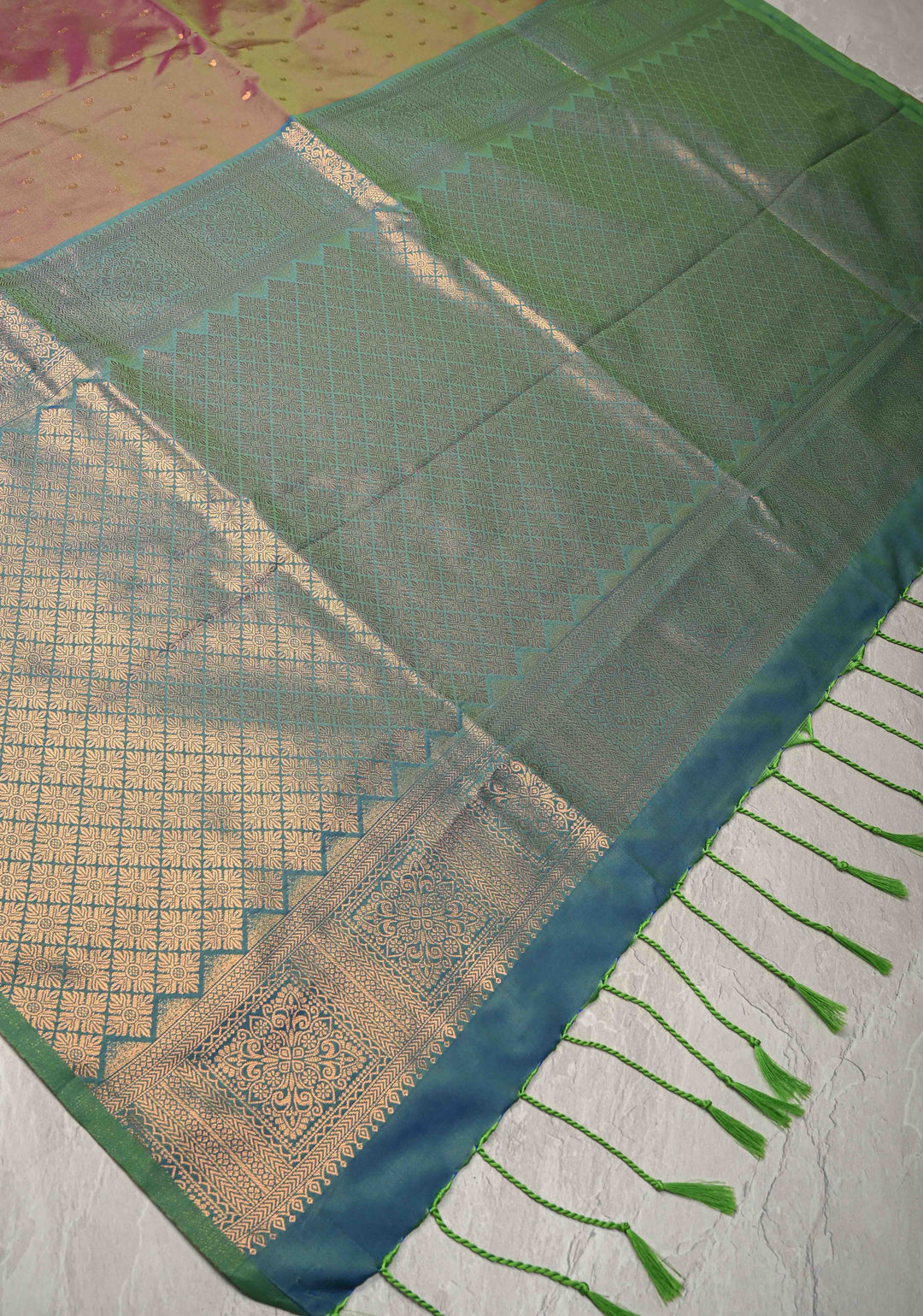 Green-pink Dual tone Kanchi Semi Silk Saree with Paisley Zari Buttas and Geomatric Motifs on Border