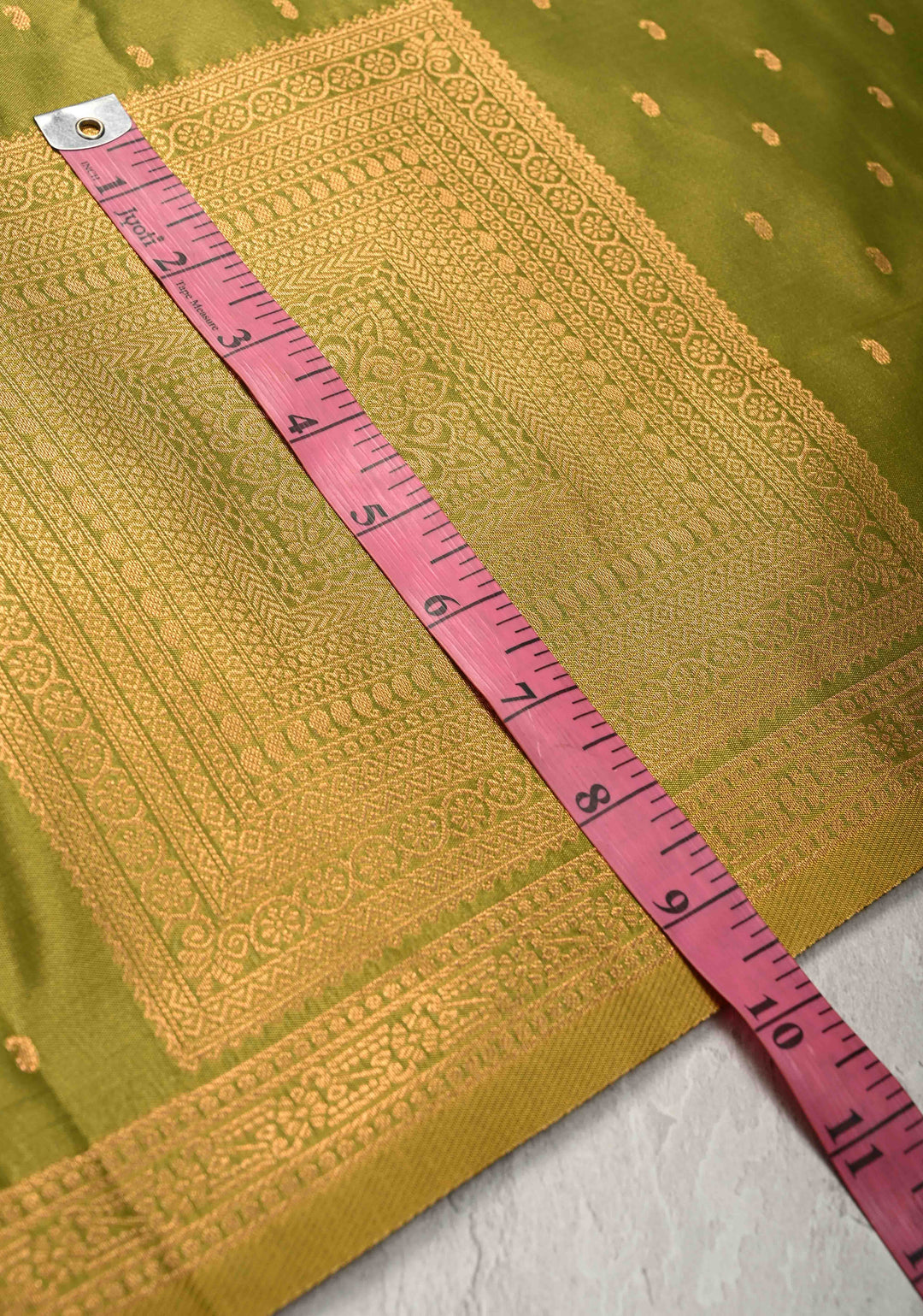 Henna Green Dual tone Kanchi Semi Silk Saree with Paisley Zari Buttas and Geomatric Motifs on Border