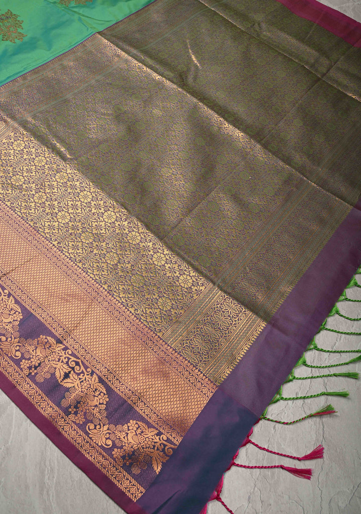 Parrot Green Kanchi Semi Silk Saree with Floral Meenakari Buttas and Contrst Zari Border
