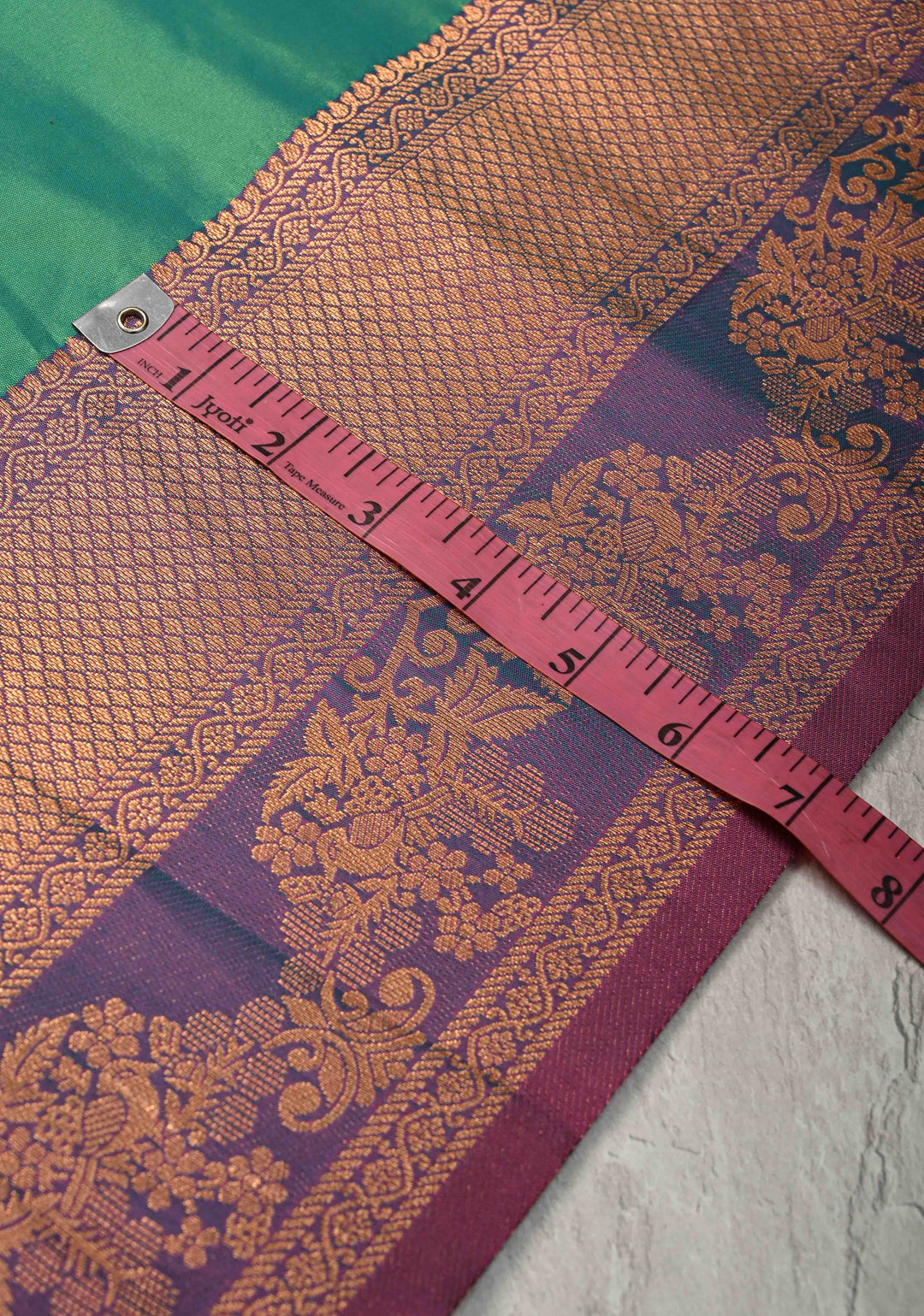 Parrot Green Kanchi Semi Silk Saree with Floral Meenakari Buttas and Contrst Zari Border