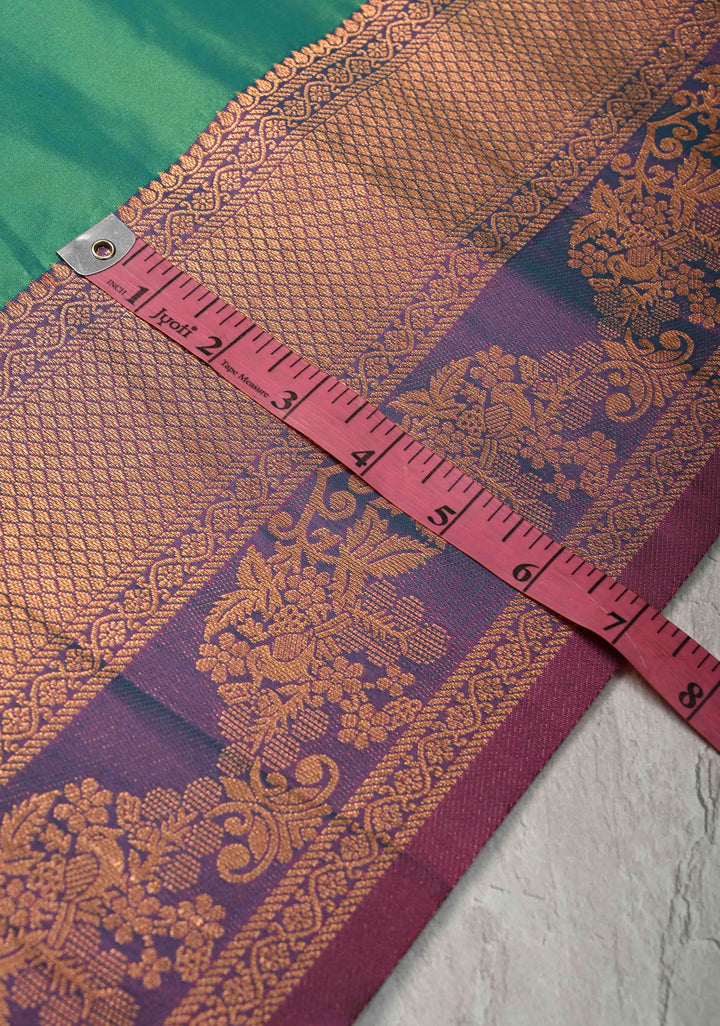 Parrot Green Kanchi Semi Silk Saree with Floral Meenakari Buttas and Contrst Zari Border