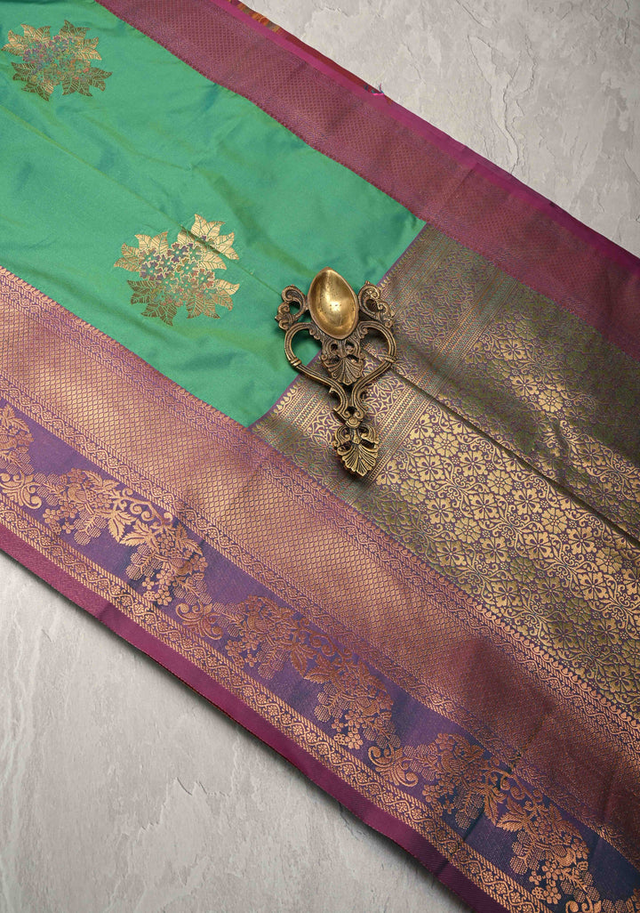 Parrot Green Kanchi Semi Silk Saree with Floral Meenakari Buttas and Contrst Zari Border