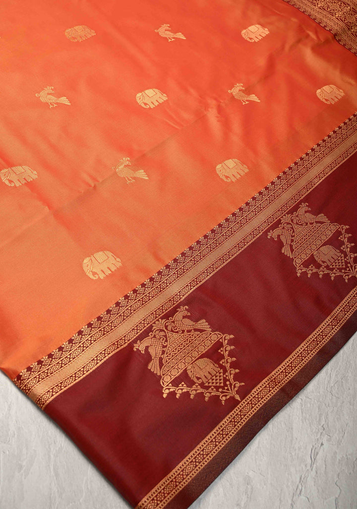 Orange Kanchi Semi Silk Saree with Elephant-Peacock Buttas and Distinct Motif Contrast Zari Border