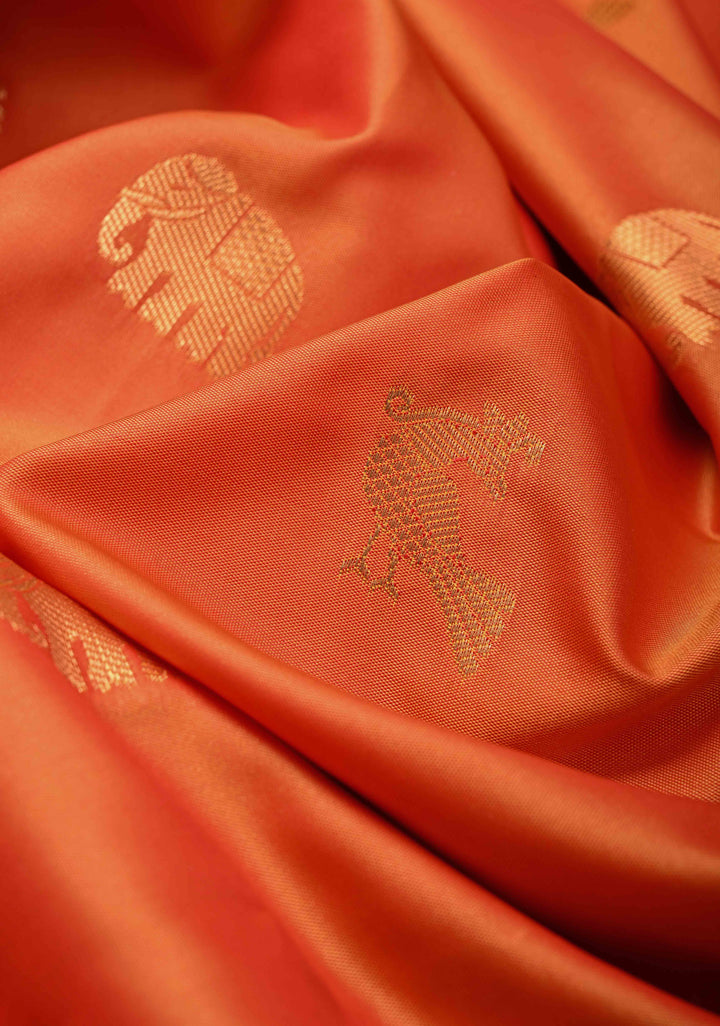 Orange Kanchi Semi Silk Saree with Elephant-Peacock Buttas and Distinct Motif Contrast Zari Border