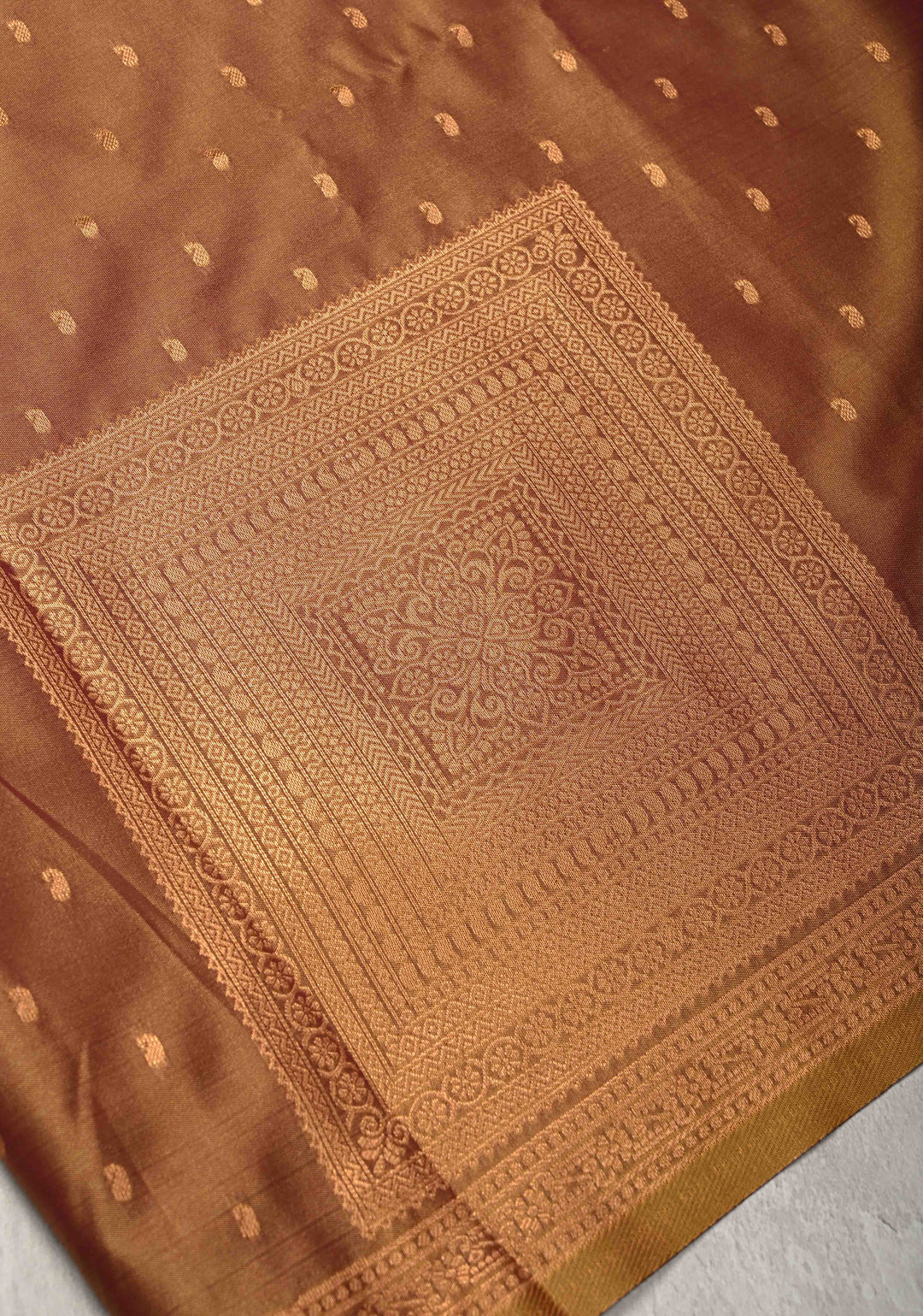Brown Dual tone Kanchi Semi Silk Saree with Paisley Zari Buttas and Geomatric Motifs on Border