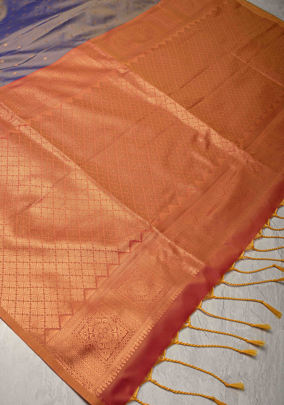 Dusty Blue Dual tone Kanchi Semi Silk Saree with Paisley Zari Buttas and Geomatric Motifs on Border