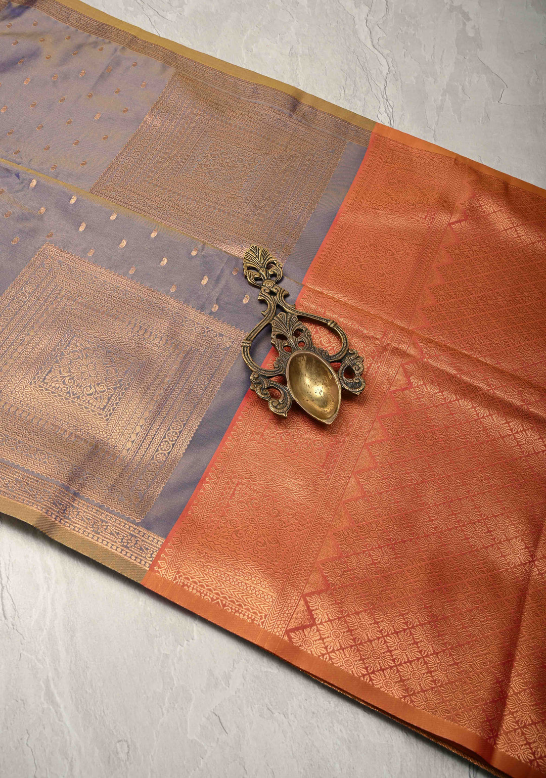 Dusty Blue Dual tone Kanchi Semi Silk Saree with Paisley Zari Buttas and Geomatric Motifs on Border