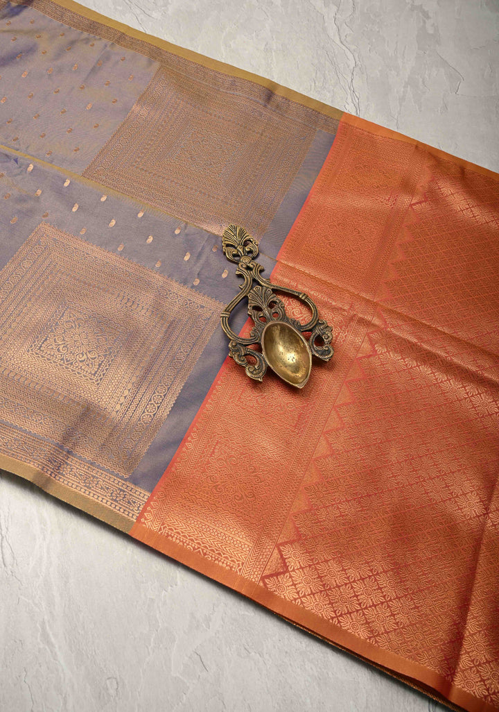 Dusty Blue Dual tone Kanchi Semi Silk Saree with Paisley Zari Buttas and Geomatric Motifs on Border