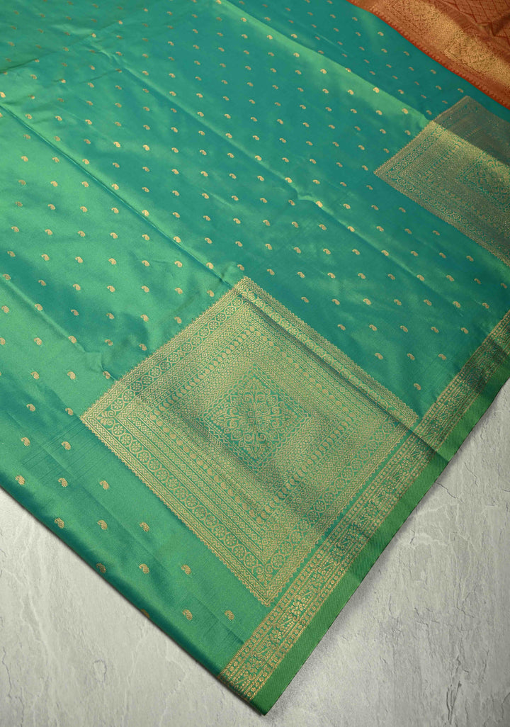 Green Dual Tone Kanchi Semi Silk Saree with Paisley Zari Buttis and Geomatric Motifs on Border