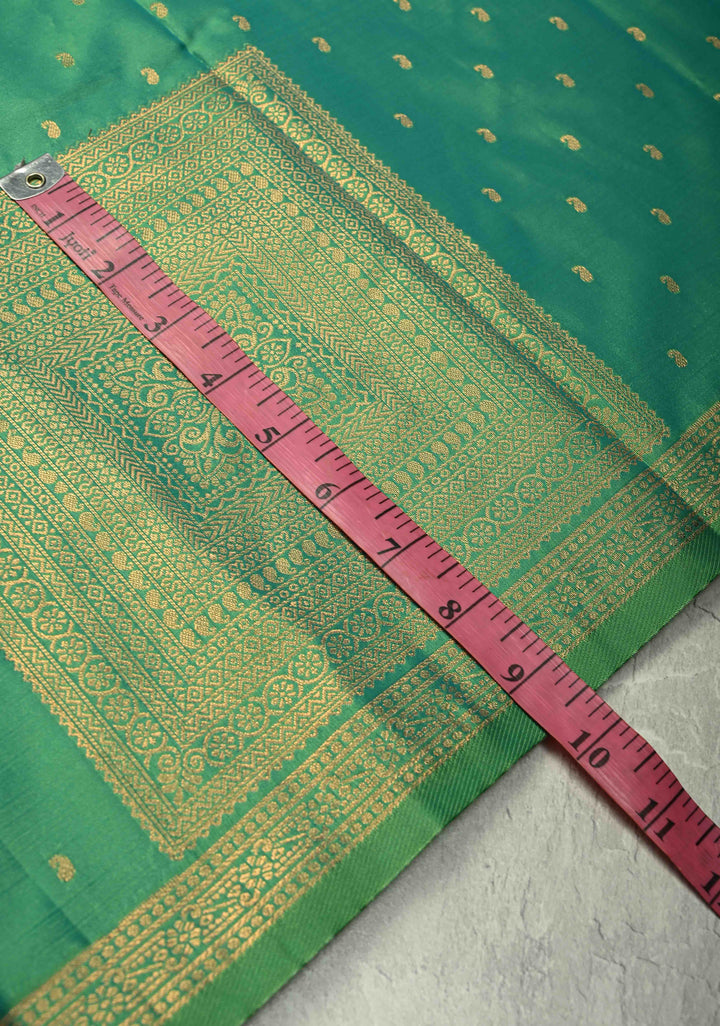 Green Dual Tone Kanchi Semi Silk Saree with Paisley Zari Buttis and Geomatric Motifs on Border