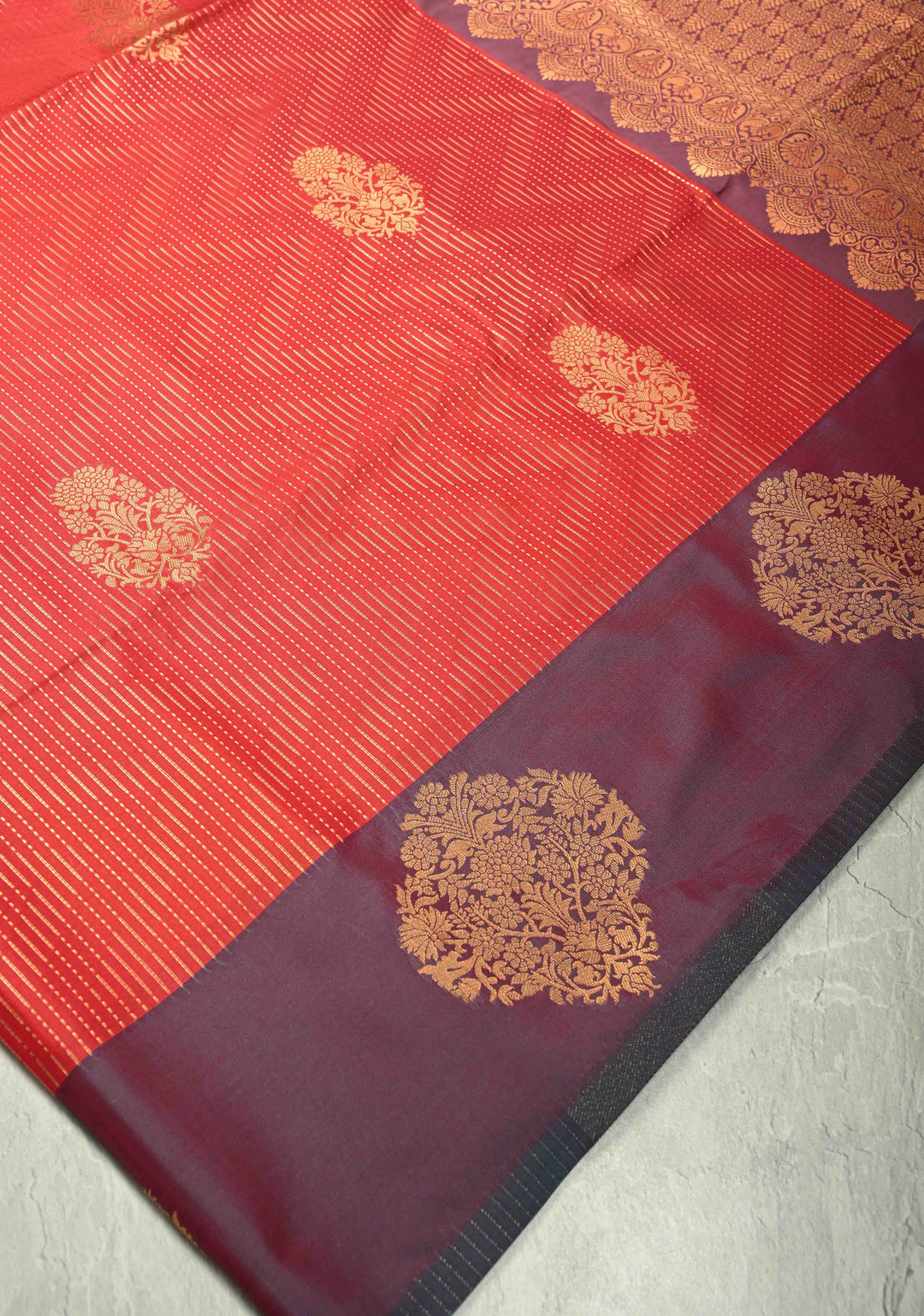 Red Vertical Zari Stripes on Kanchi Semi Silk Saree with Floral Buttas and Distinct Motifs on Contrast Border