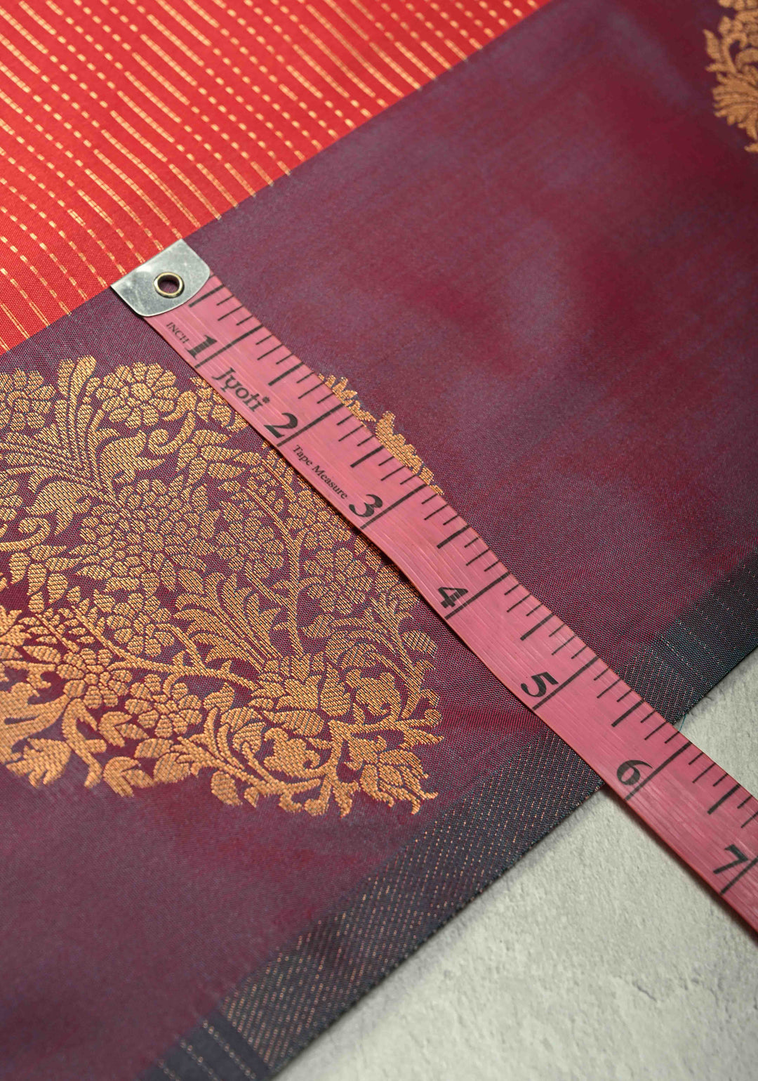 Red Vertical Zari Stripes on Kanchi Semi Silk Saree with Floral Buttas and Distinct Motifs on Contrast Border