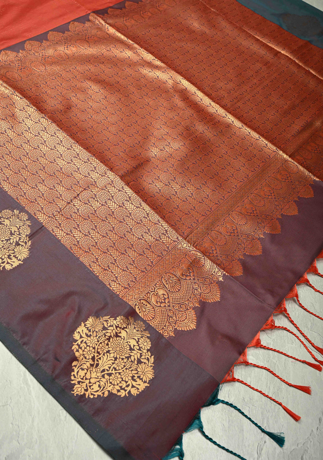 Vermilion Red Vertical Zari Stripes on Kanchi Semi Silk Saree with Floral Buttas and Distinct Motifs on Contrast Border