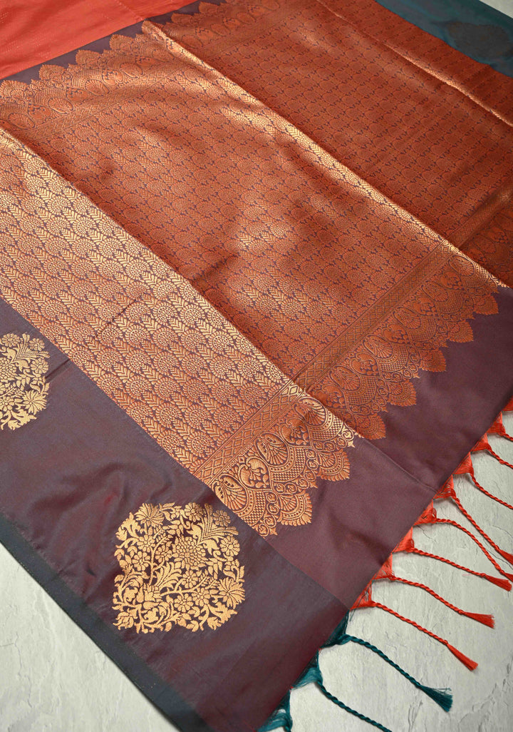 Vermilion Red Vertical Zari Stripes on Kanchi Semi Silk Saree with Floral Buttas and Distinct Motifs on Contrast Border