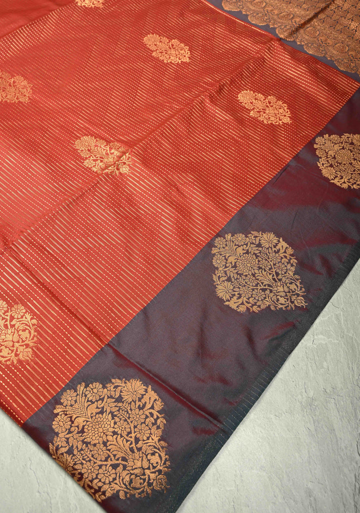 Vermilion Red Vertical Zari Stripes on Kanchi Semi Silk Saree with Floral Buttas and Distinct Motifs on Contrast Border