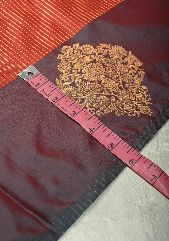 Vermilion Red Vertical Zari Stripes on Kanchi Semi Silk Saree with Floral Buttas and Distinct Motifs on Contrast Border
