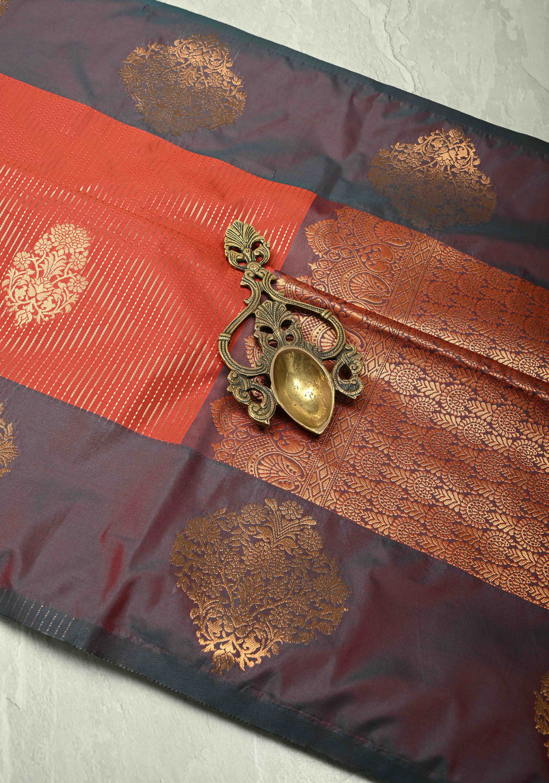Vermilion Red Vertical Zari Stripes on Kanchi Semi Silk Saree with Floral Buttas and Distinct Motifs on Contrast Border