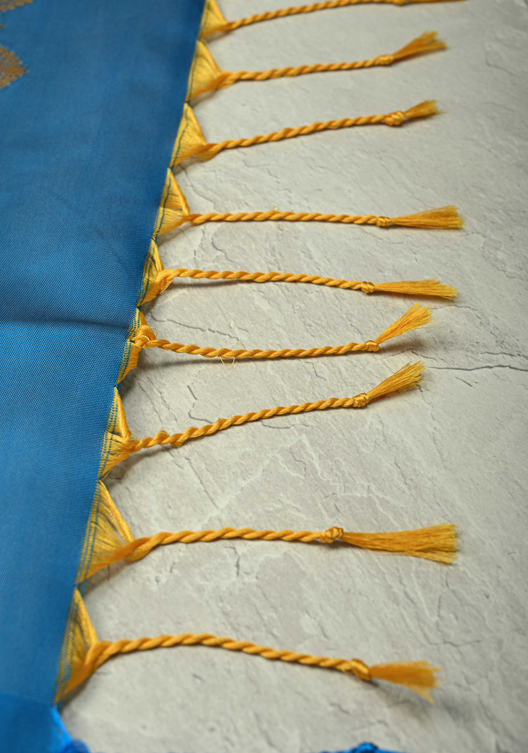 Sage Green-Blue Dual tone Vertical Zari Stripes on Kanchi Semi Silk Saree with Floral Buttas and Distinct Motifs on Contrast Border