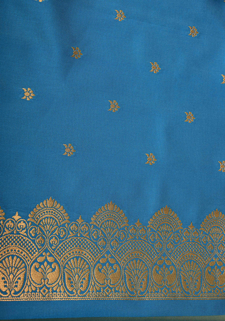 Sage Green-Blue Dual tone Vertical Zari Stripes on Kanchi Semi Silk Saree with Floral Buttas and Distinct Motifs on Contrast Border