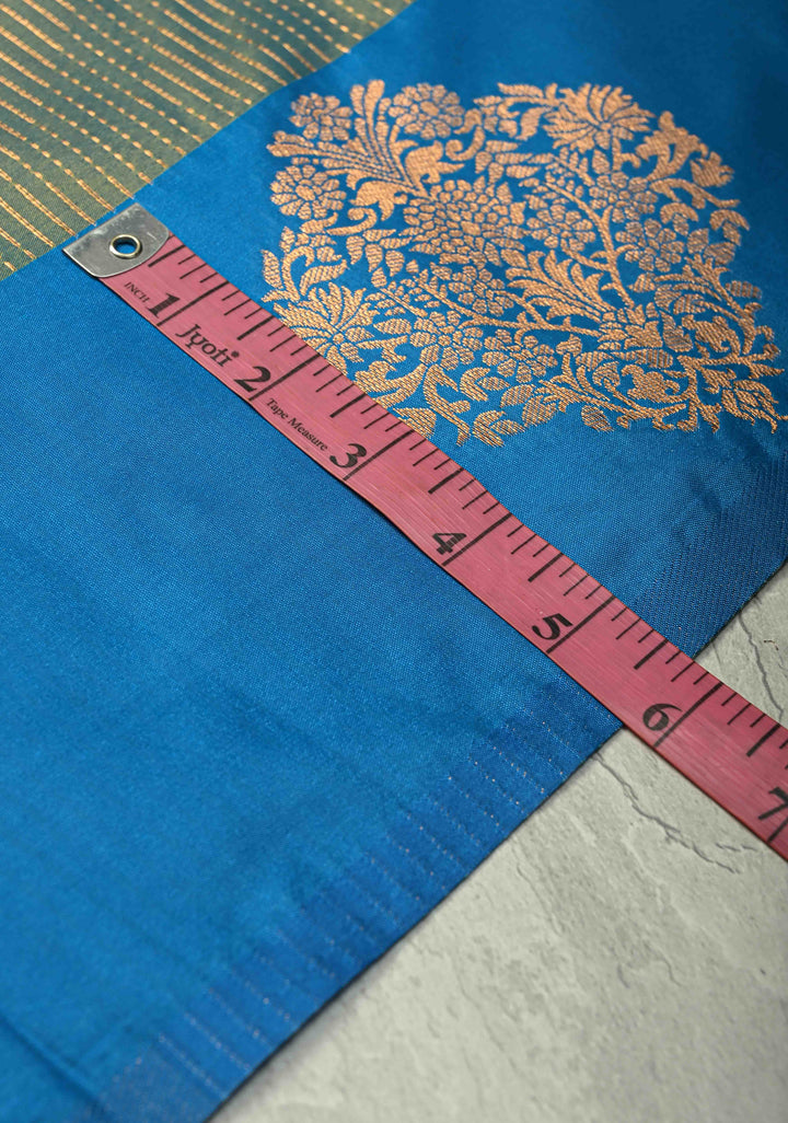 Sage Green-Blue Dual tone Vertical Zari Stripes on Kanchi Semi Silk Saree with Floral Buttas and Distinct Motifs on Contrast Border