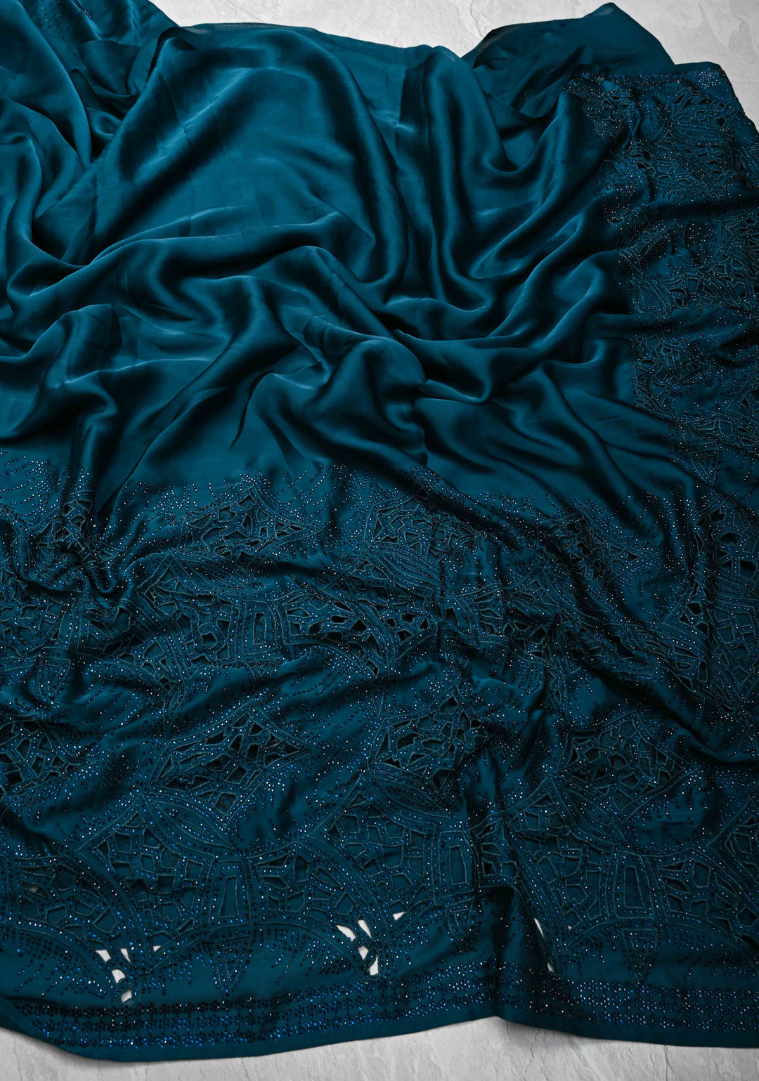 Peacock Blue Satin Machine Cutwork Saree and Tone on Tone Powder Stones work