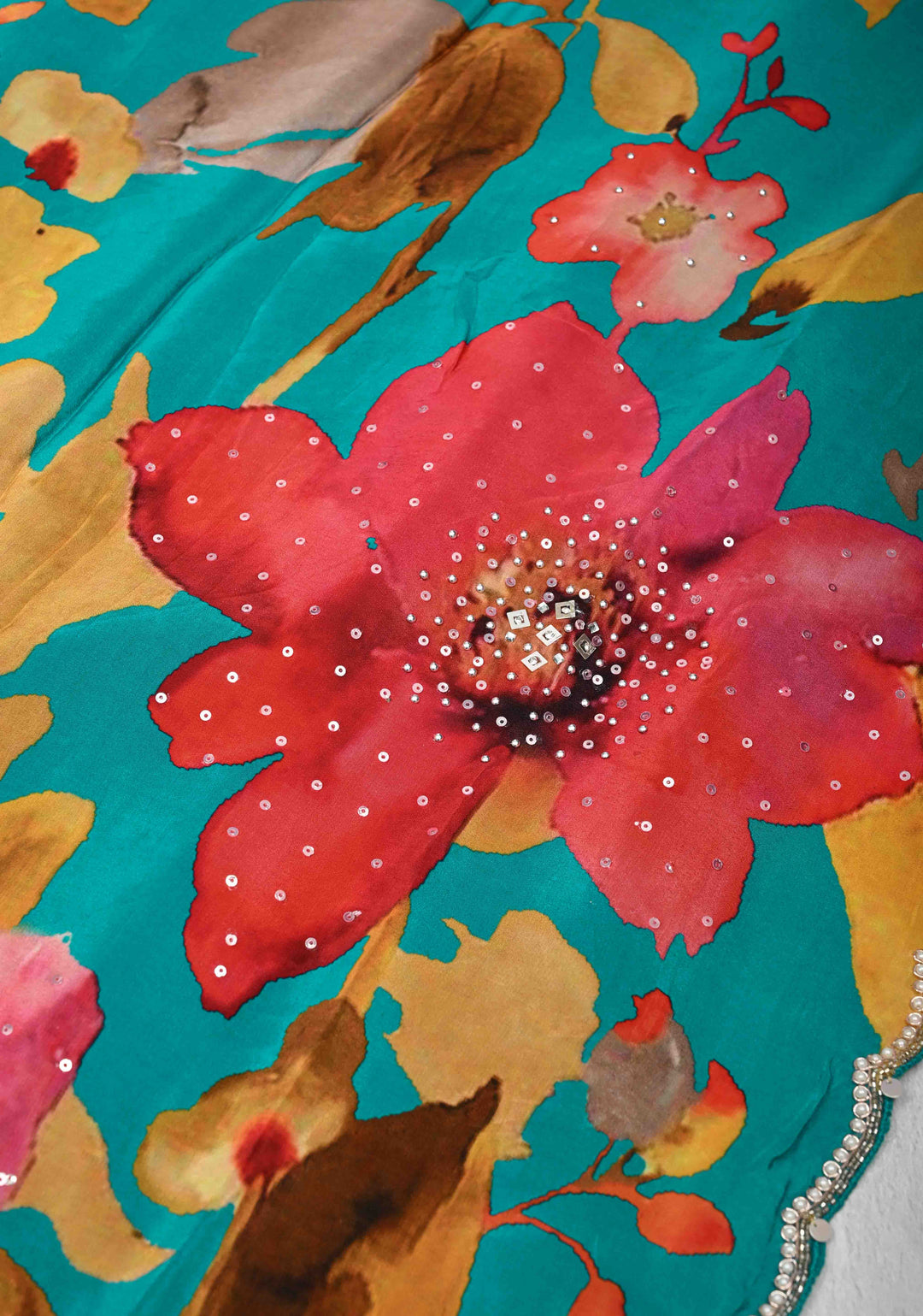 Aqua Blue Floral Digital Print on Glossy Chinon Saree with Sequins and Cutdana-Moti Scallop Border