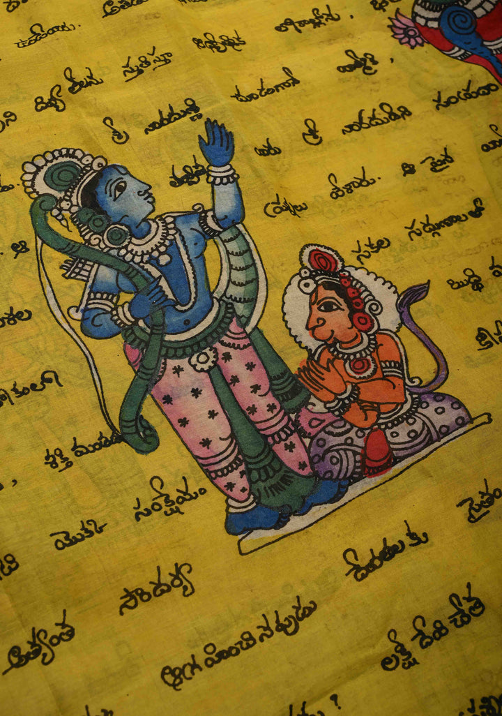 Telugu Script and Motiifs Theme : Yellow Authentic Pen Kalamkari Handpainted on Pure Mangalagiri Silk Cotton Saree with Contrast Border | SHOBITAM
